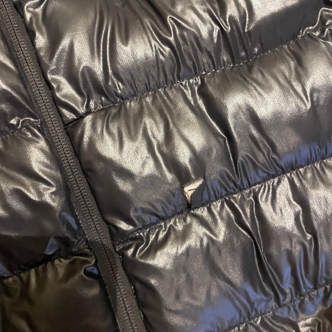 Svart glansig dunjacka från Peak Performance - 90