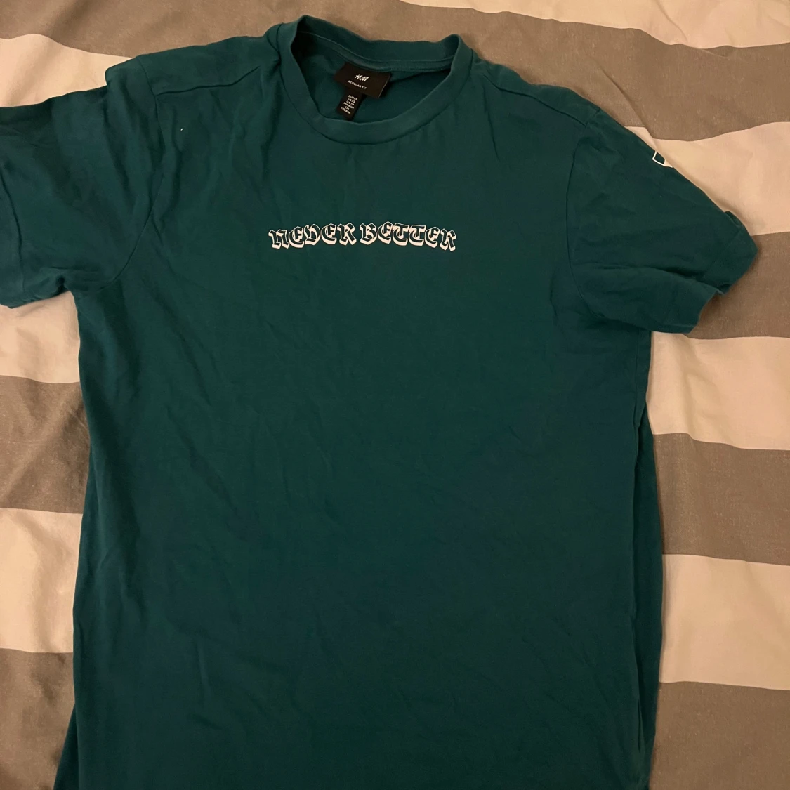 Turkos t-shirt med text - 90