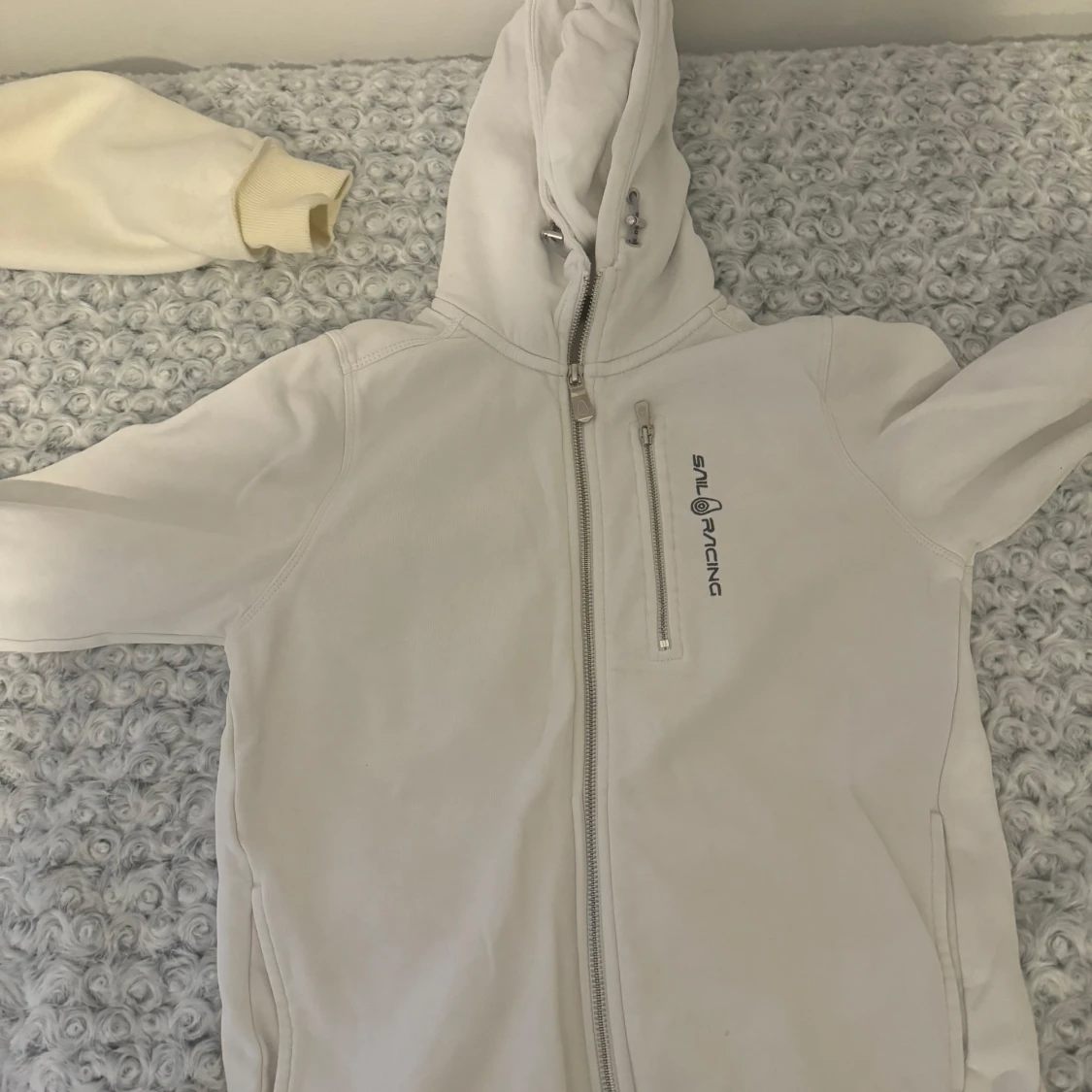Vit jacka från Sail Racing