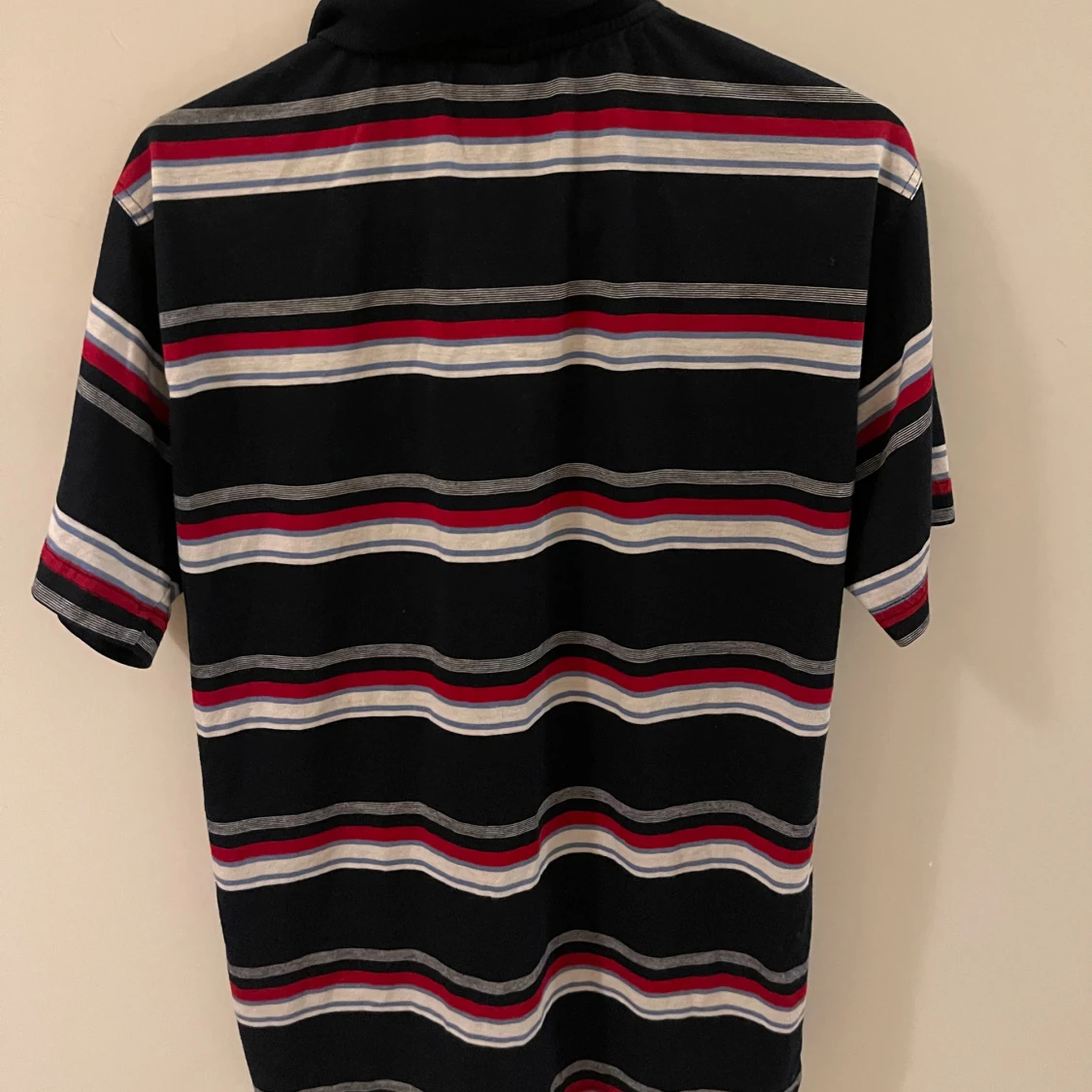 Randig pikétröja från Lacoste - 1