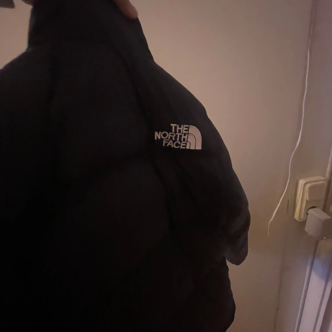 Svart dunjacka från The North Face - 93