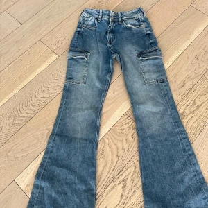 Cargo jeans utsvängda  - Jeans 