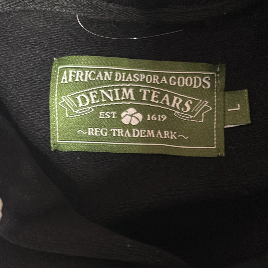 Svart hoodie med vita blommor från Denim Tears - 91