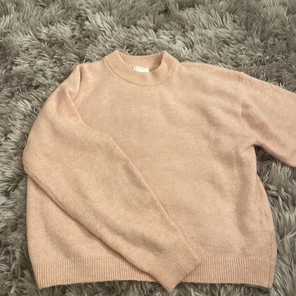 Beige stickad tröja från H&M