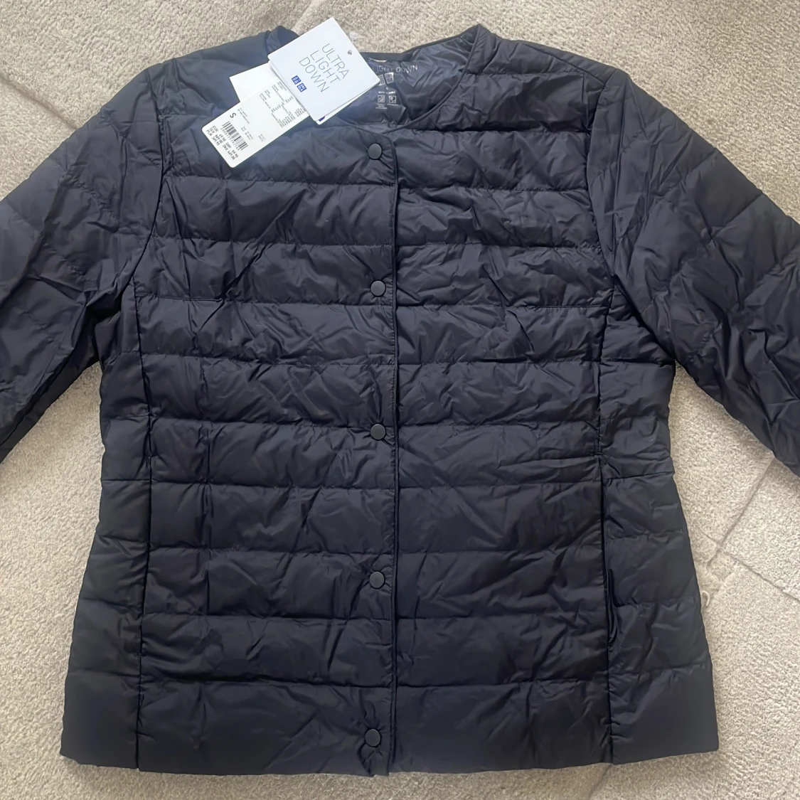 Svart dunjacka från Uniqlo - 1