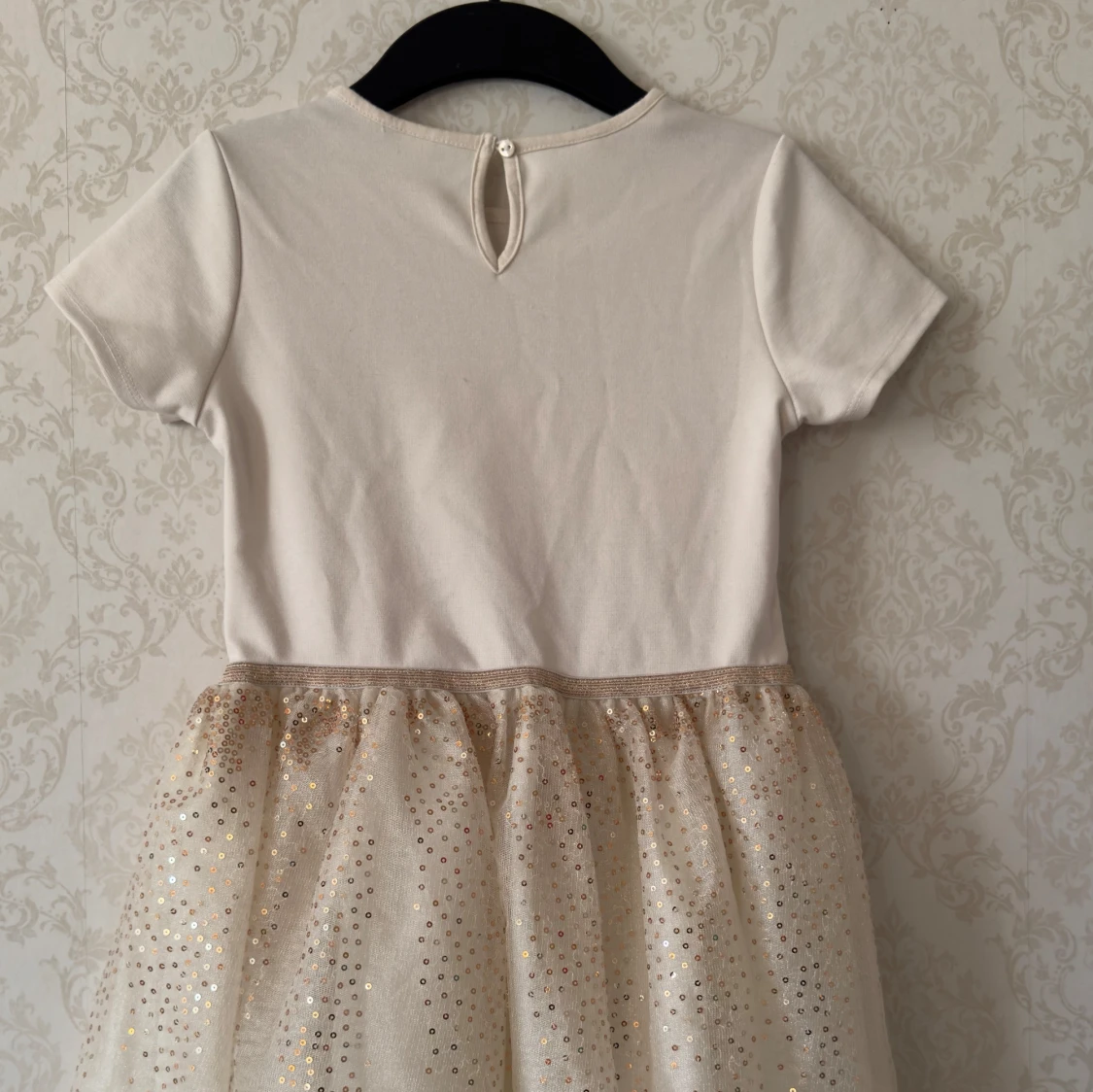 Vit ”Frozen” klänning med glittrig kjol - H&M - 1