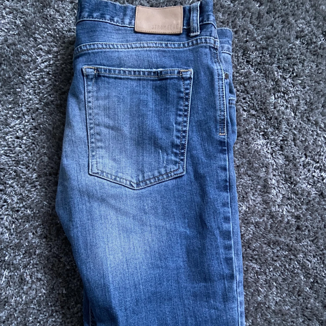 Blå jeansbyxor  - 1