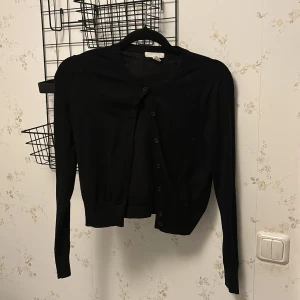 Kofta  - Vanlig svart kofta i xs. 