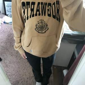 Hoddie med Hogwarts tryck