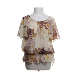 Blommig blus från H&M - Inga defekter