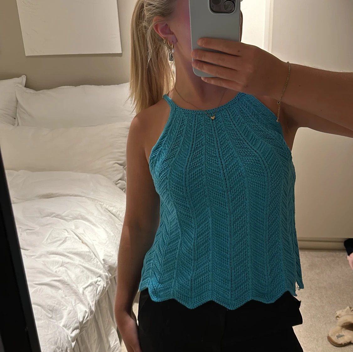 Turkos stickad linnetopp