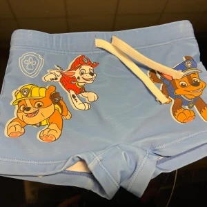 Badshorts helt nya barn - Badshorts/Swimwear.  Strl. 86/92 för 1-2 år