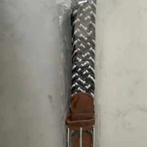 Flätat grisch bälte - Grisch