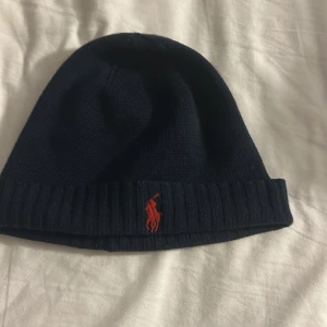 Ralph lauren mössa  - Tja säljer nu min Ralph lauren mössa eftersom den inte har kommit till användning