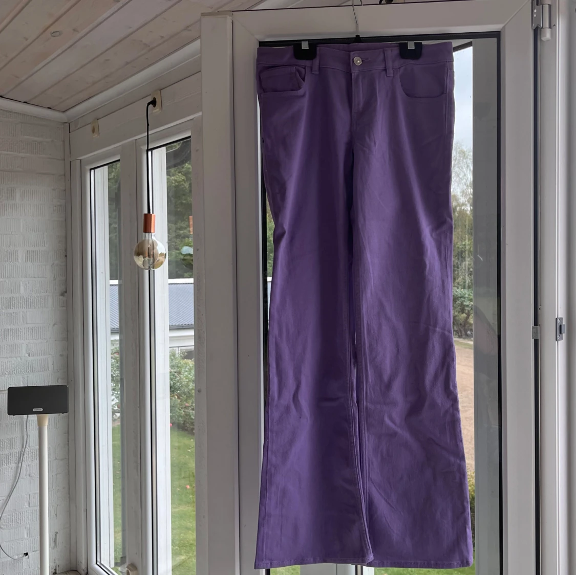 Lila byxor med bootcut - 90