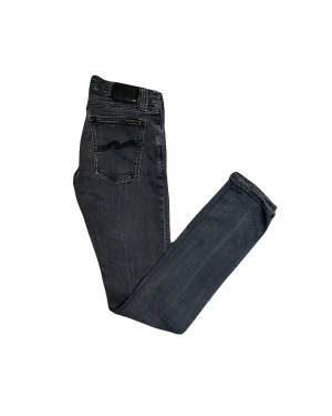Nudie jeans - Mycket snygga gråa jeans från nudie. Storlek W29 L34. Modell Tight John. Tveka inte att fråga!