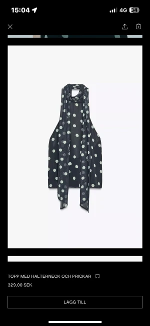 Svart prickig halterneck topp - Snygg svart halterneck topp med vita prickar och långa band som kan knytas runt halsen. Perfekt till fest. Är endast provad med prislapp kvar💗