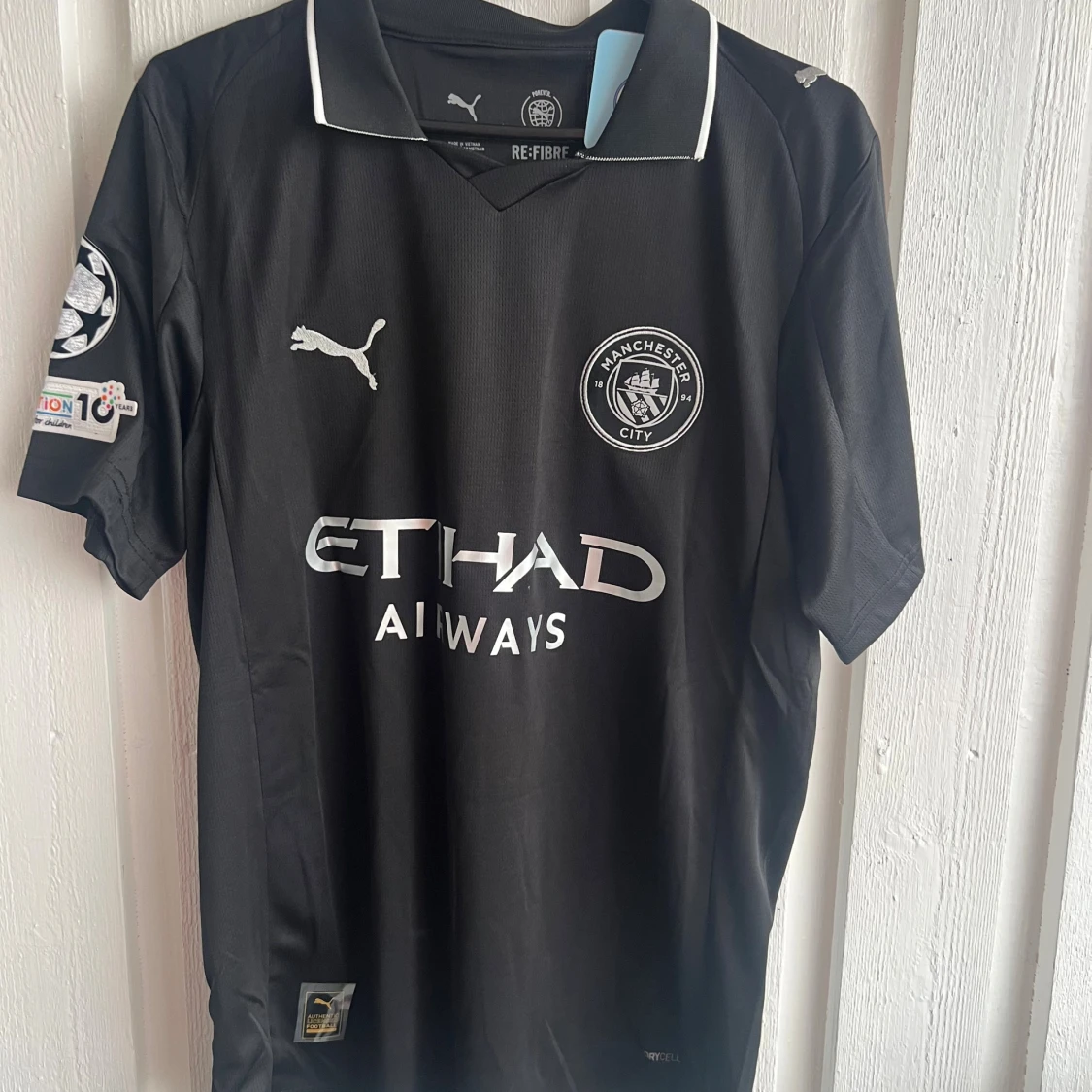 Manchester City svart fotbollströja Puma