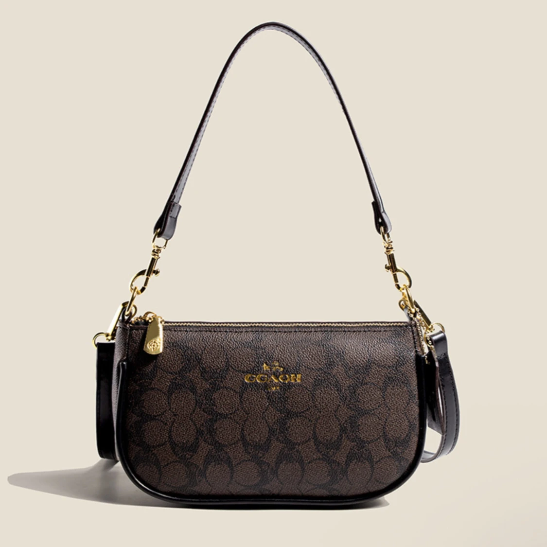 Coach axelväska med monogrammönster