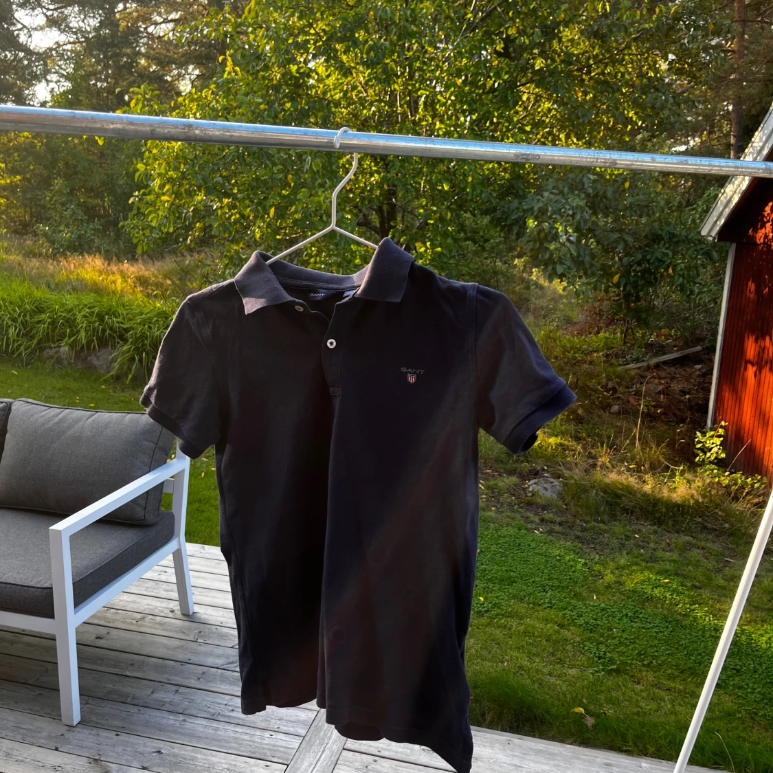 Mörkblå pikétröja från Gant