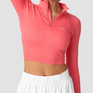 Träningsset - Korallfärgad träningstopp och tillhörande tights. Har inte kommit till användning så därav säljs det. 