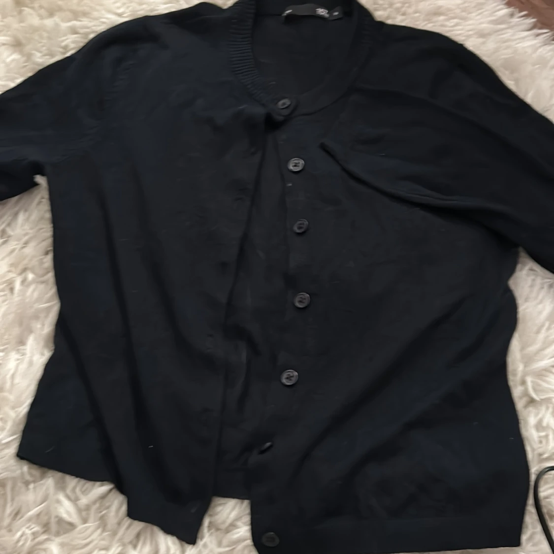 Svart kofta