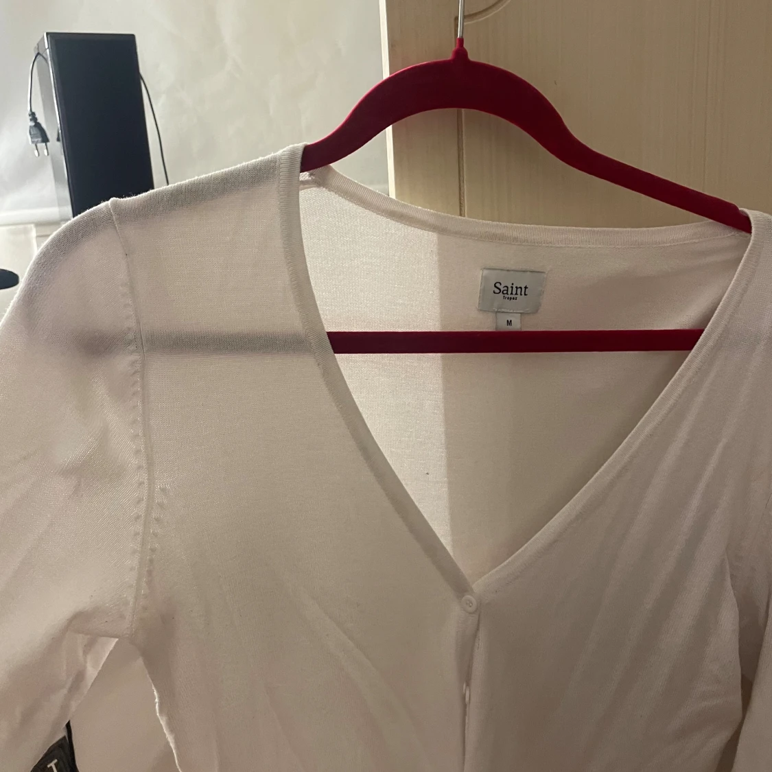 Kofta med v-rigning och knappar - 2