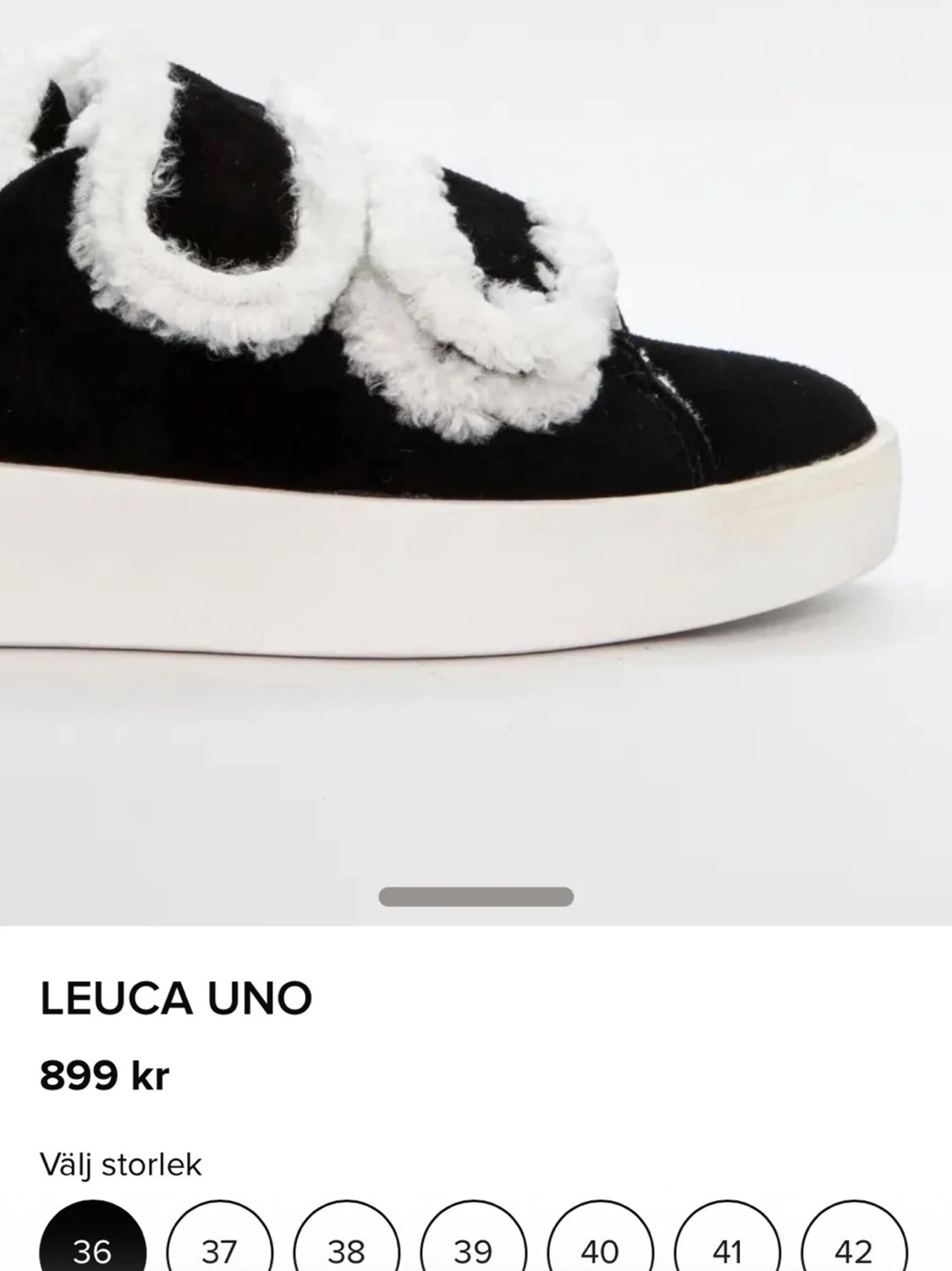 Svarta sneakers med fuskpäls från Duffy Stl 39