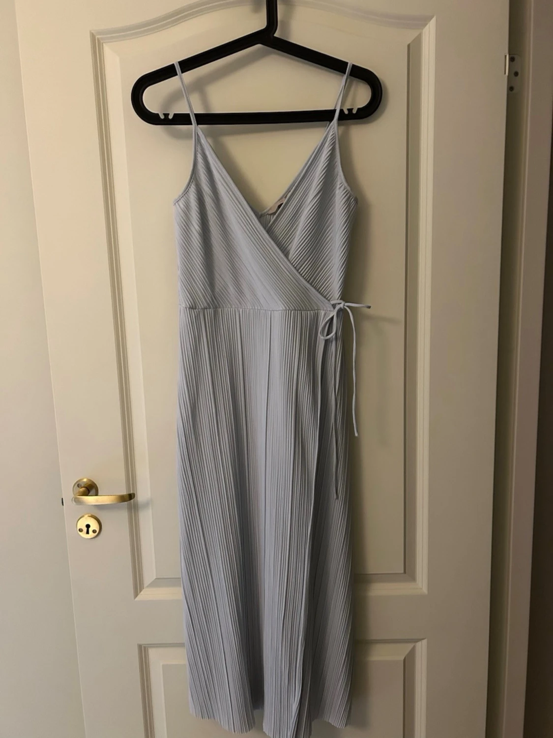 Ljusblå omlottklänning H&M