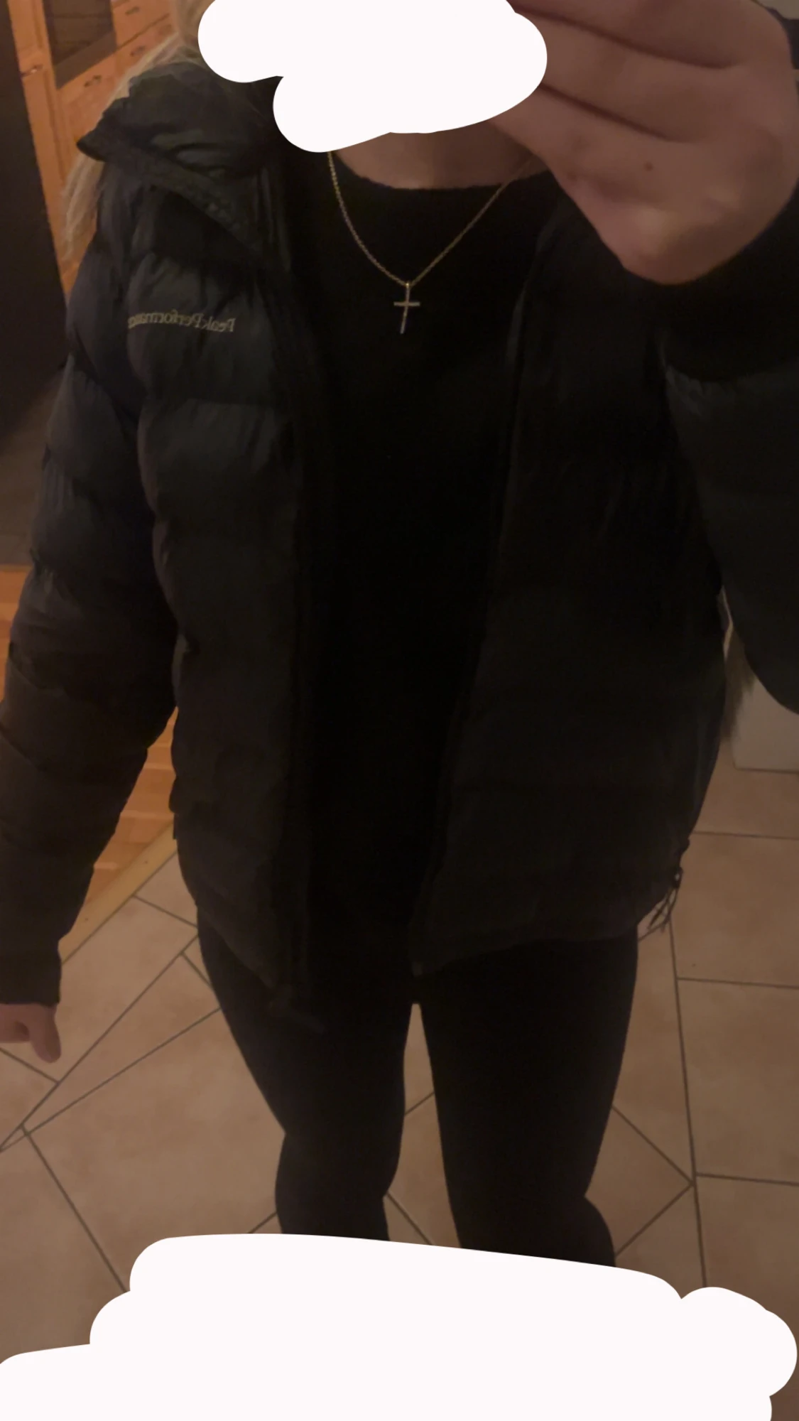 Svart pufferjacka från Peak Performance