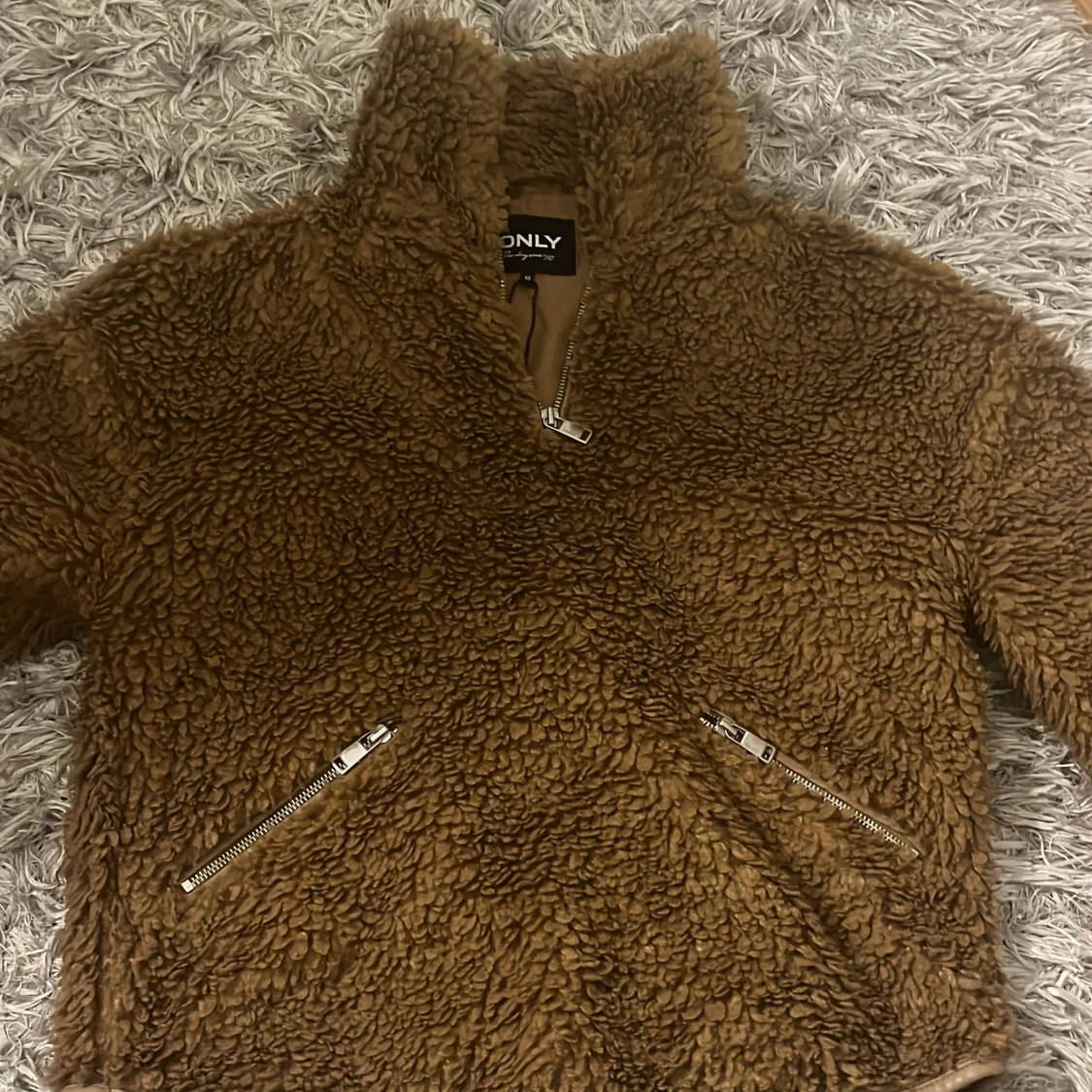 Brun teddyjacka från ONLY XS