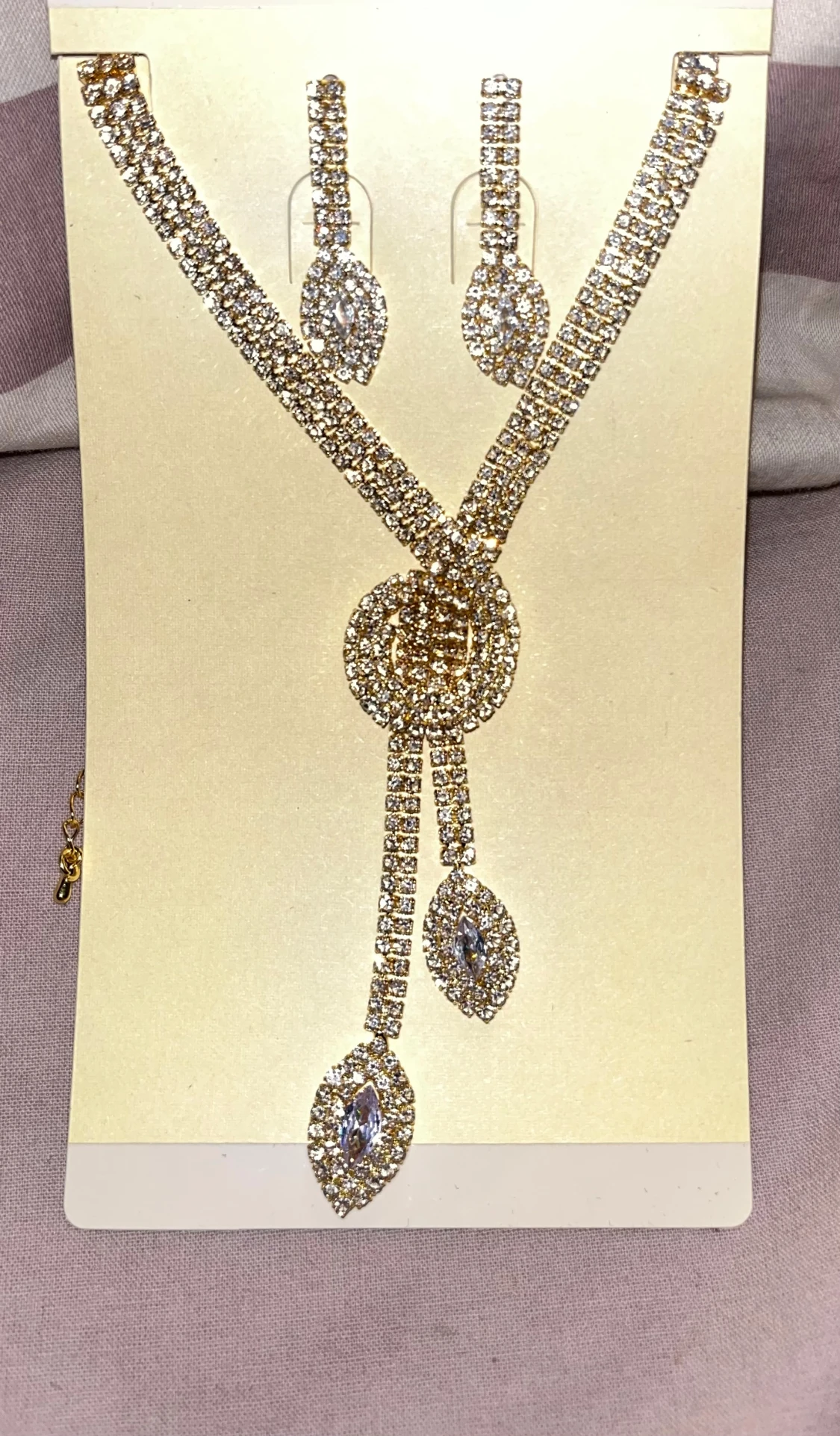 Glittrig guldväst med strassdetaljer - 1