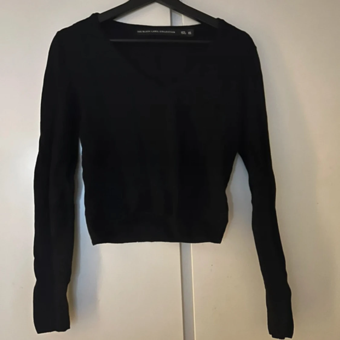 Svart ribbad tröja från The Black Label