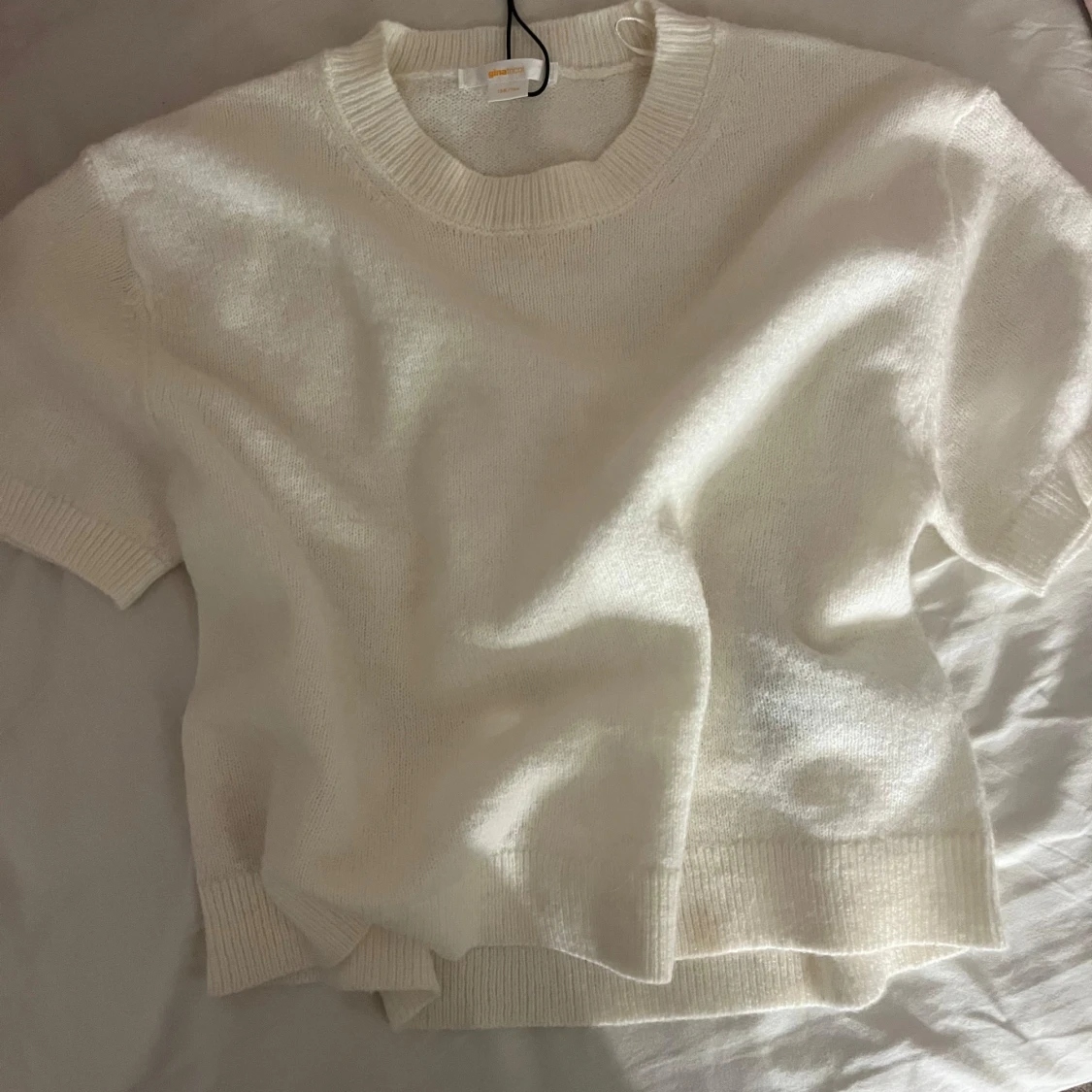 Vit stickad tröja