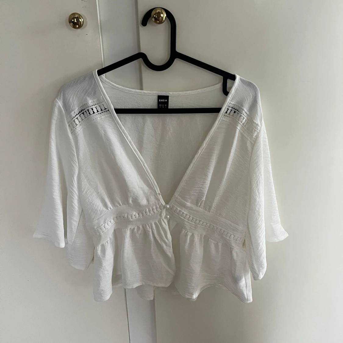 Vit blus v ringad  - 2