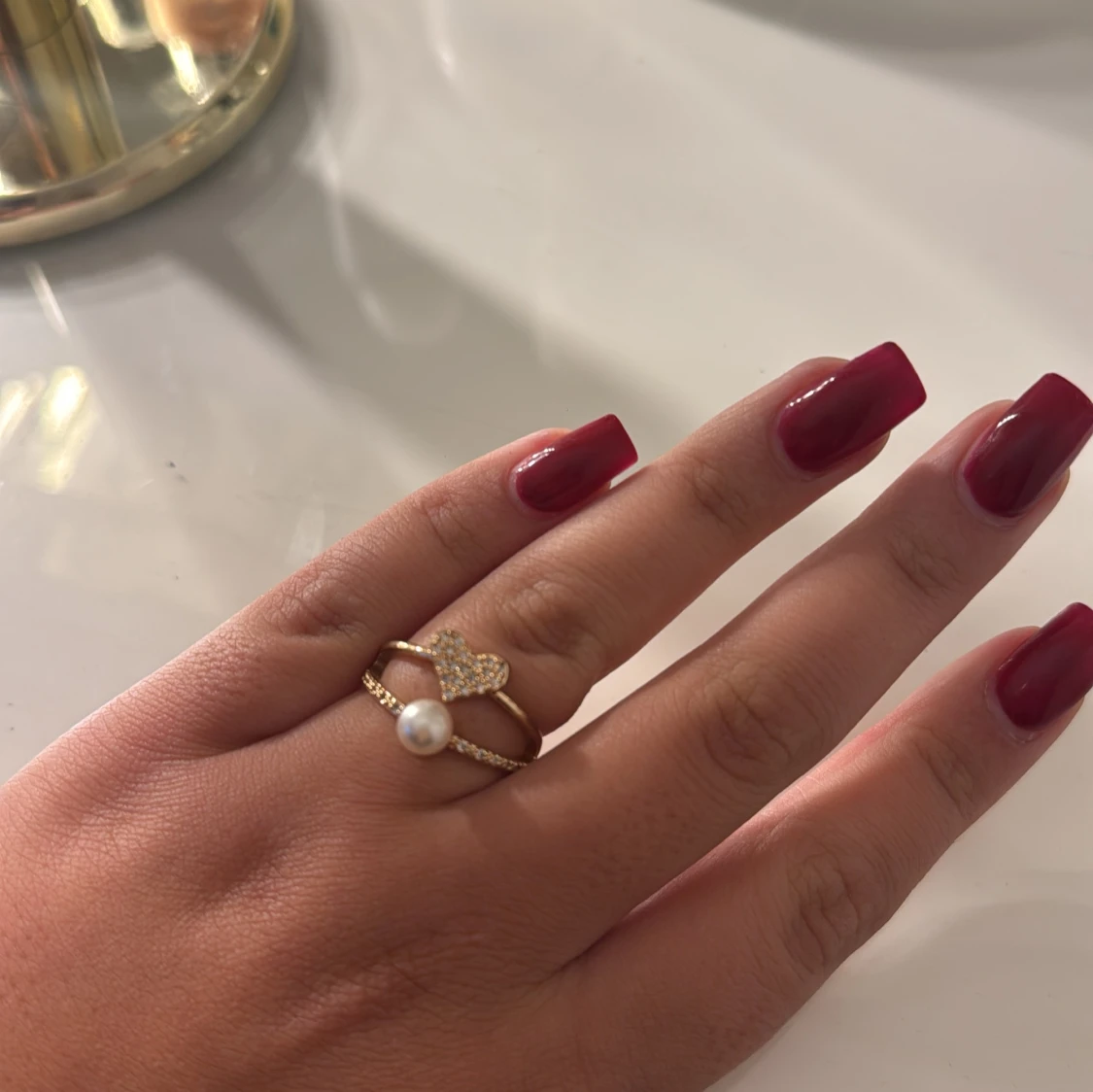 Ring med hjärta och pärla