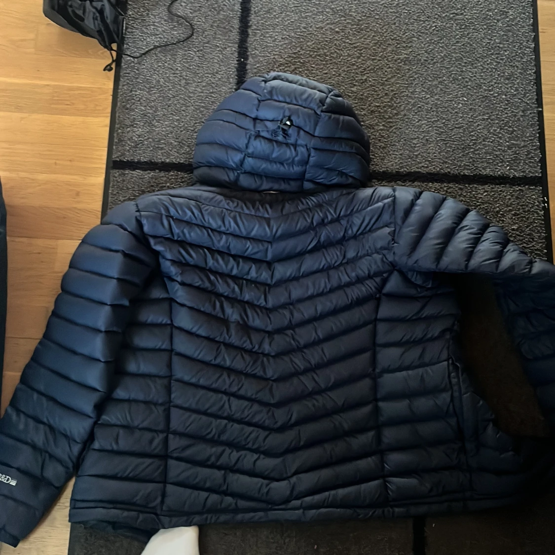 Mörkblå dunjacka Peak Performance - 1