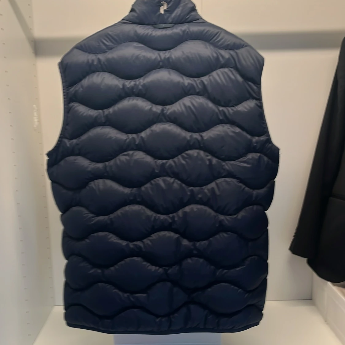 Mörkblå dunväst Peak Performance - 1