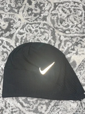 Nike mössa - Helt ny, har it ens använt,