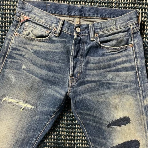 Ralph Lauren  Denim & Supply jeans med slitningar - Helt nya Ralph Lauren jeans | Innerbenslängd 80 Lårvidd 28 Fotvidd 18 Midja 40