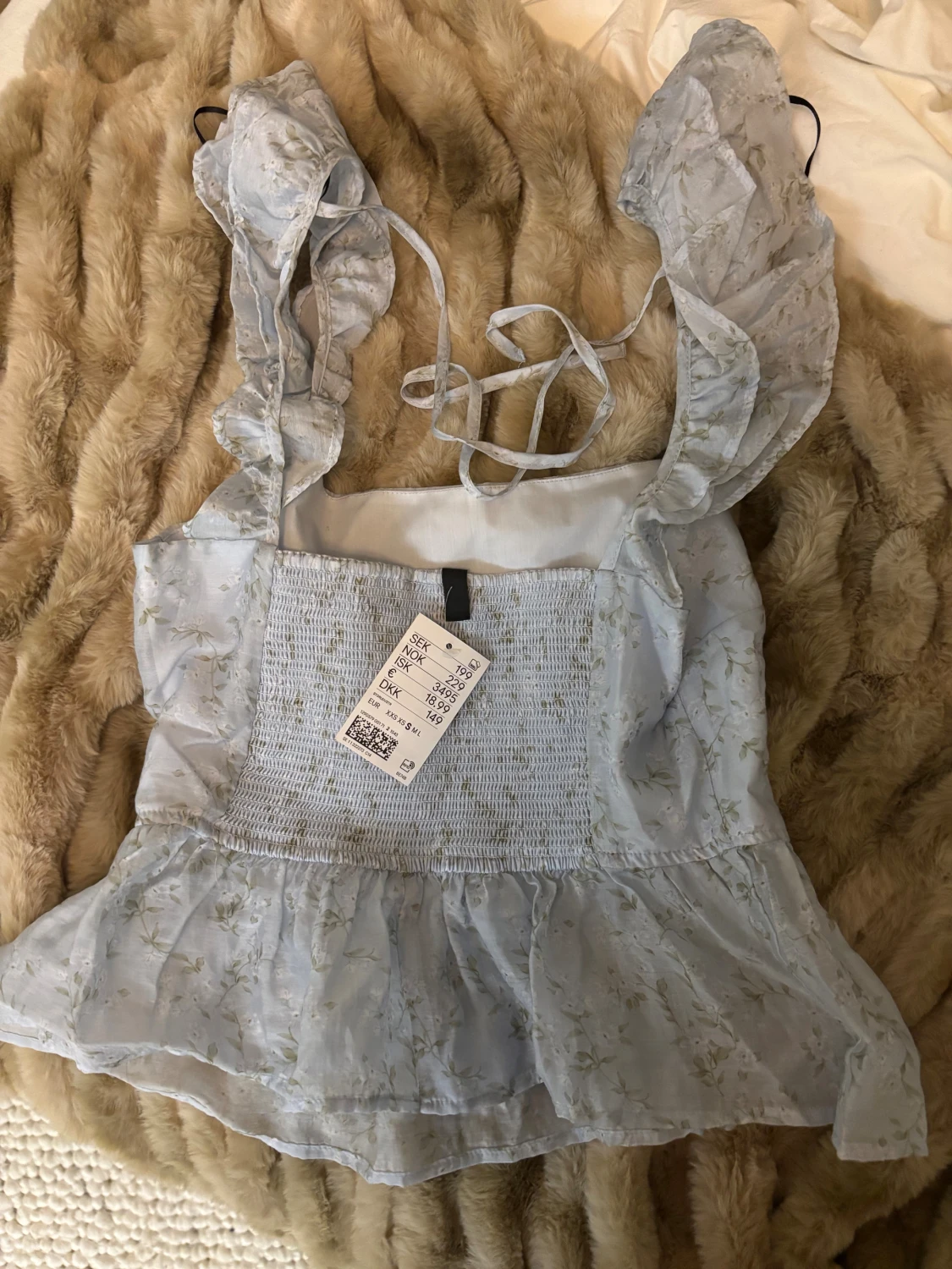 Blommig ljusblå blus från H&M Divided