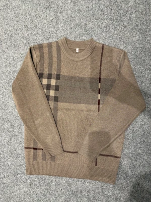 Beige sweater -Inspired by Burberry - No brand. Looks like burberry sweater. Fits S-M