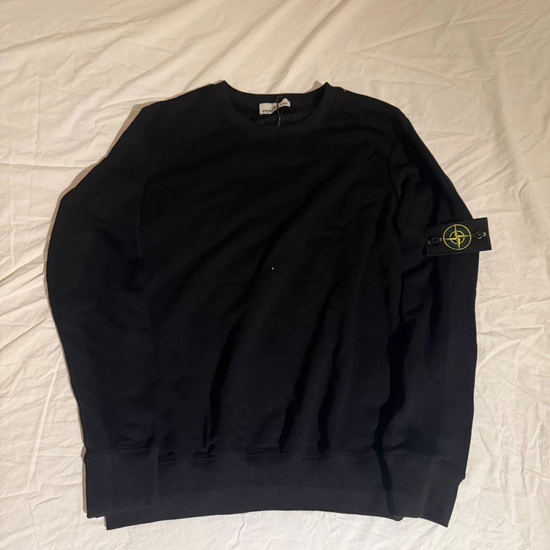 Svart sweatshirt från Stone Island