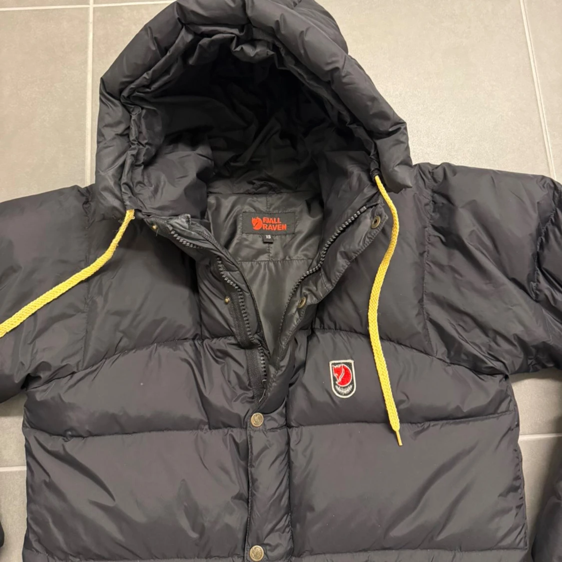 Svart pufferjacka från Fjällräven XS - 1