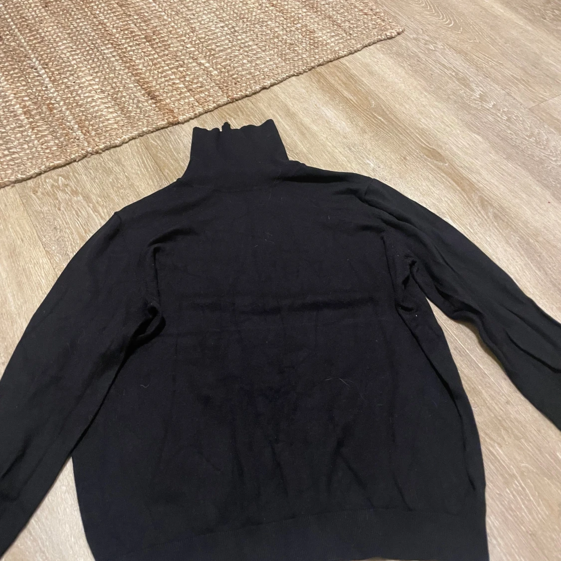 Svart polotröja från H&M Basics