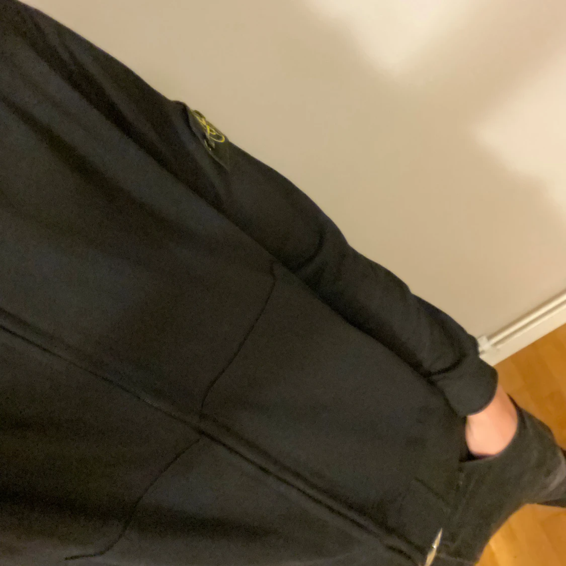 Svart ziptröja från Stone Island