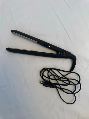 Plattång från Remington - Plattång från Remington med keramiska plattor. Knappt använd. 