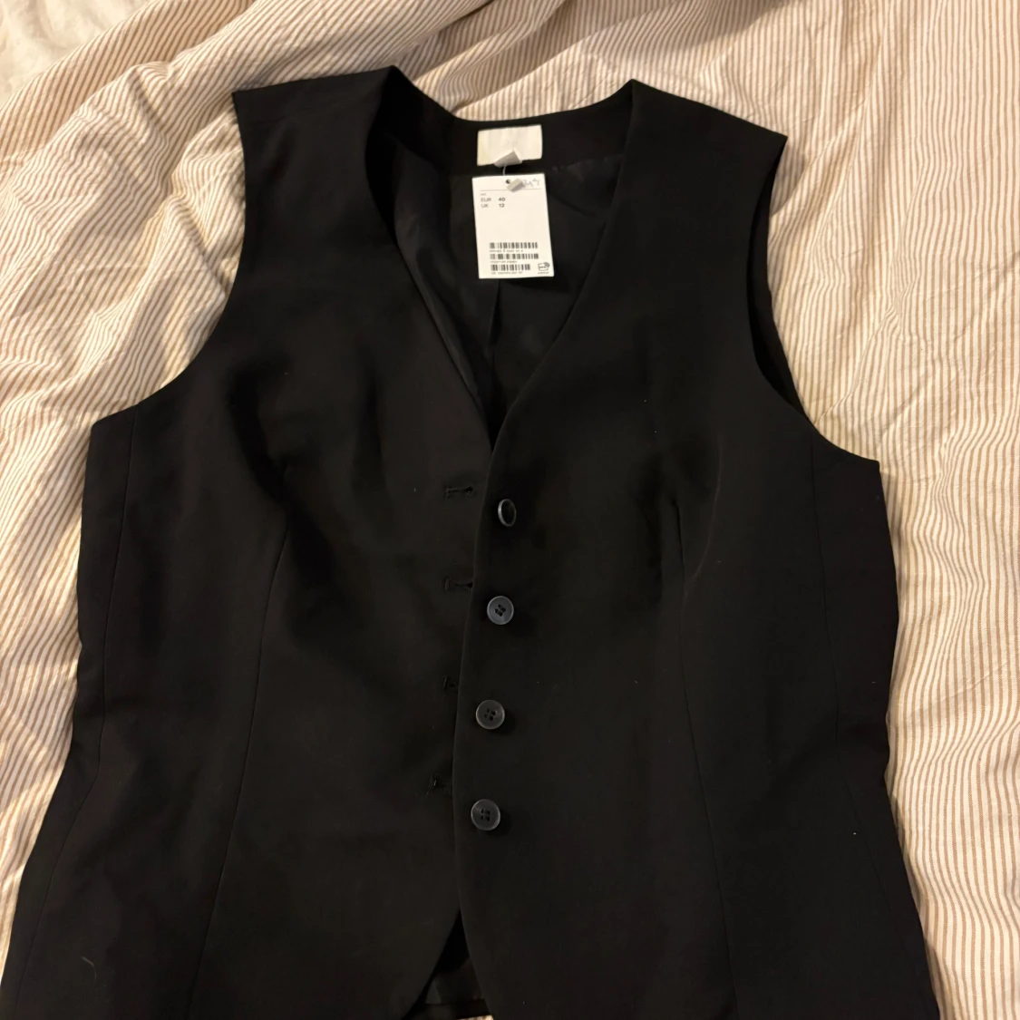 Svart klassisk väst från H&M