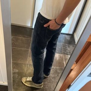 Skinny Nudie Jeans Grim Tim 34/34 - Mörkblå