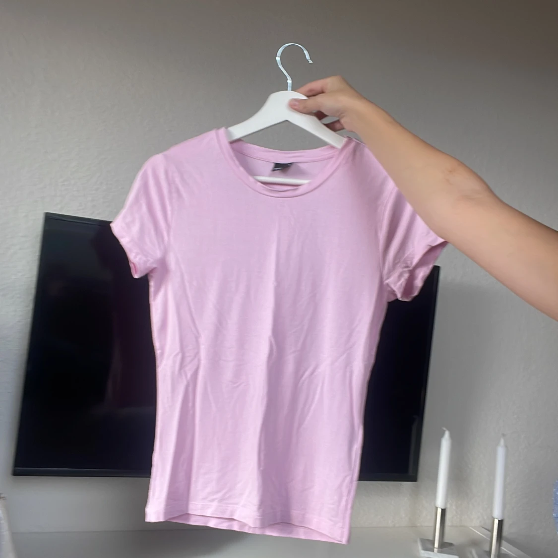 Ljusrosa t-shirt från Gina Tricot